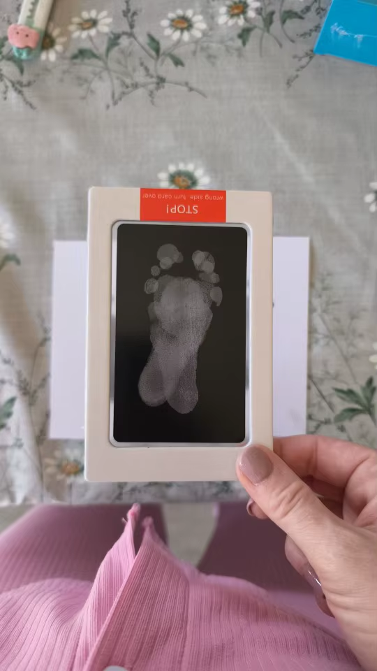 Inkless pet paw print pad and keepsake card in protective packaging